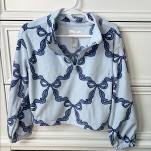 Place French blue bow 1/4 zip pullover